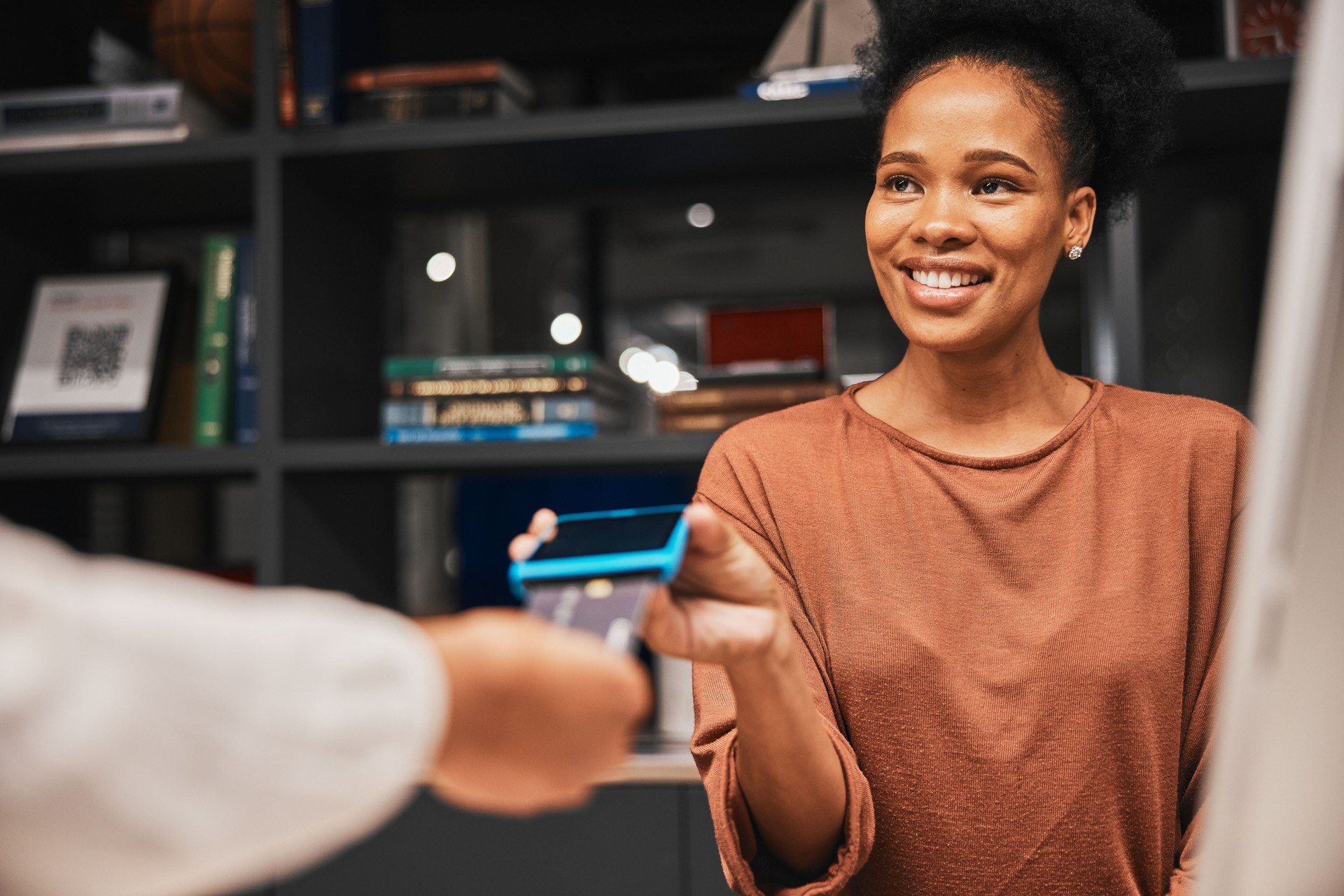 Black woman, machine and credit card for payment, checkout transaction or digital money transfer in store. African American female customer, lady or client with contactless purchase or electronic pay